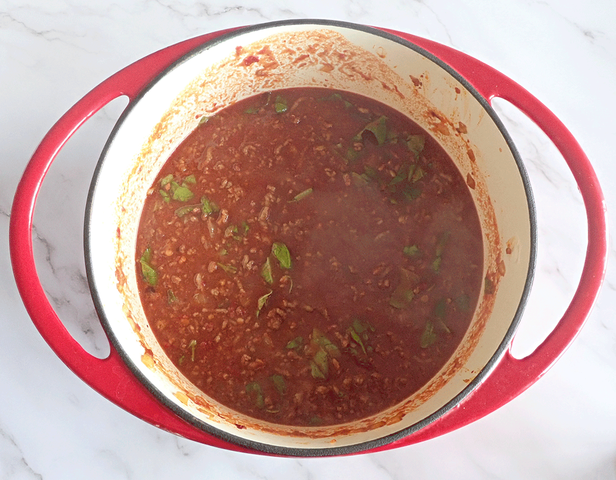 meat sauce cooking in a pan