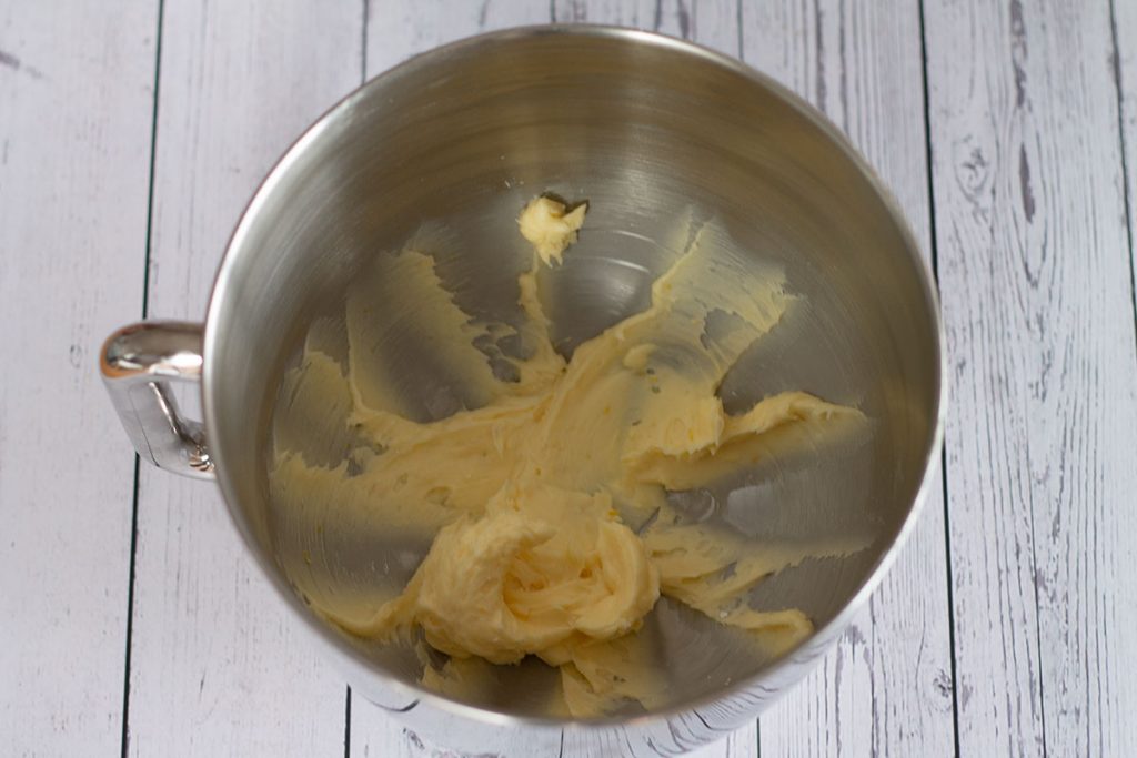creamed butter and icing sugar in a mixing bowl