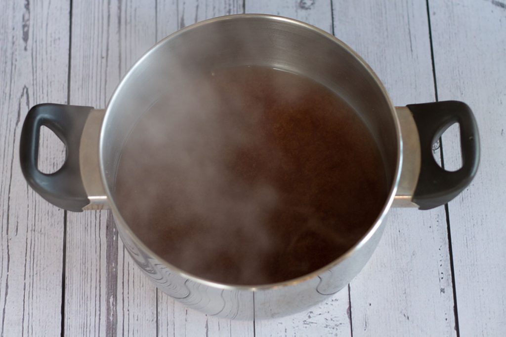 miso and soy broth in saucepan