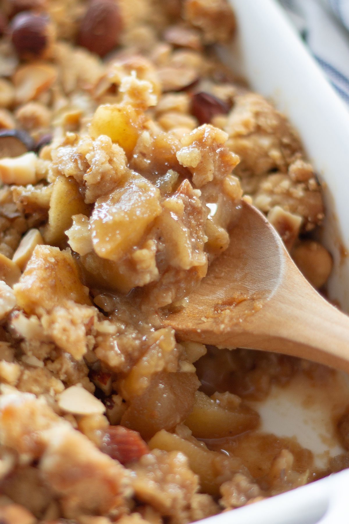 spoonful of spiced apple crumble up close