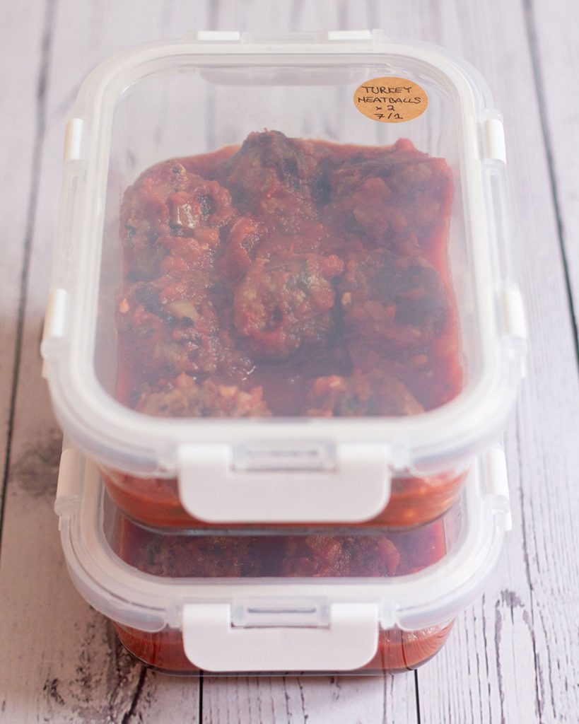 turkey meatballs in containers ready to be frozen