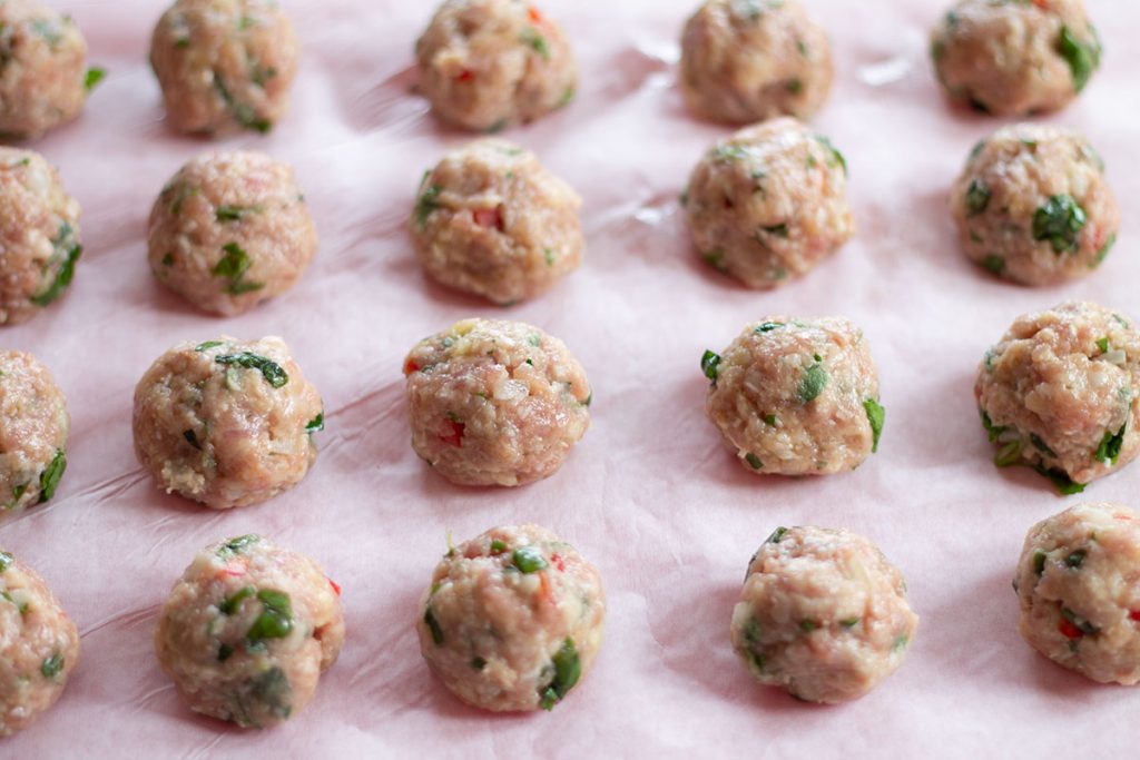 formed meatballs on a tray
