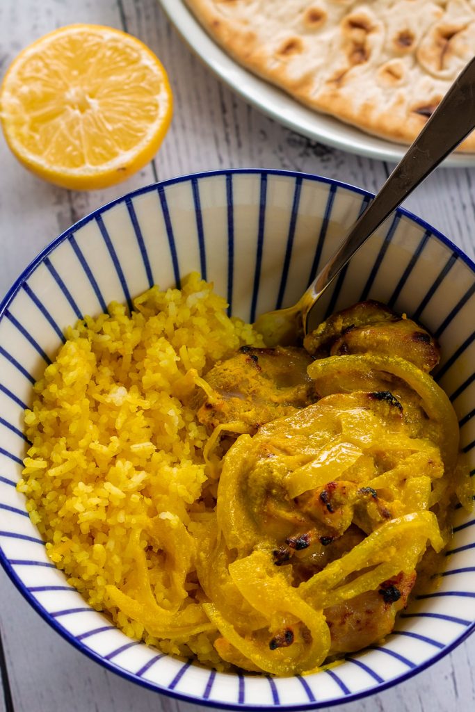 A bowl of Grilled Lemon & Turmeric Chicken Thighs