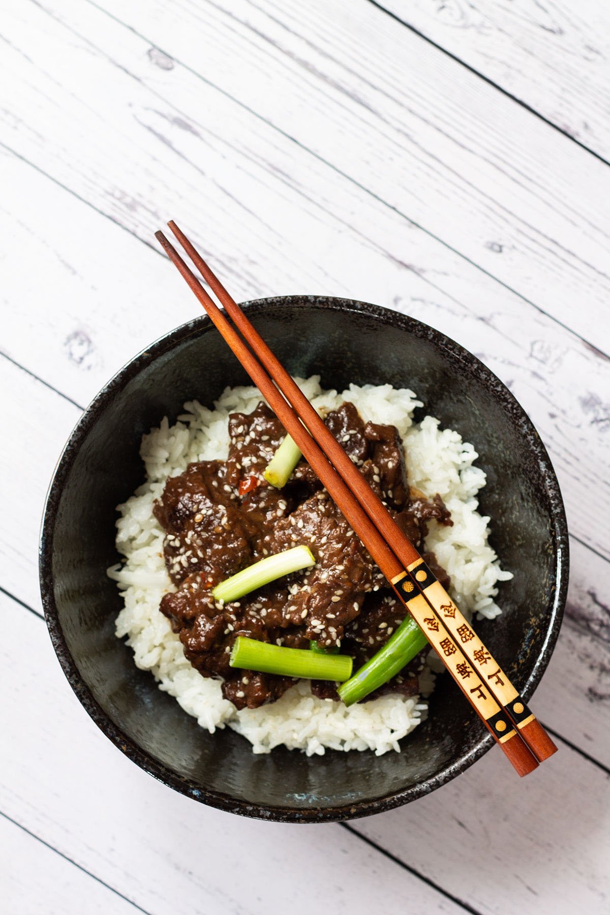 A bowl of Spicy Instant Pot Mongolian Beef