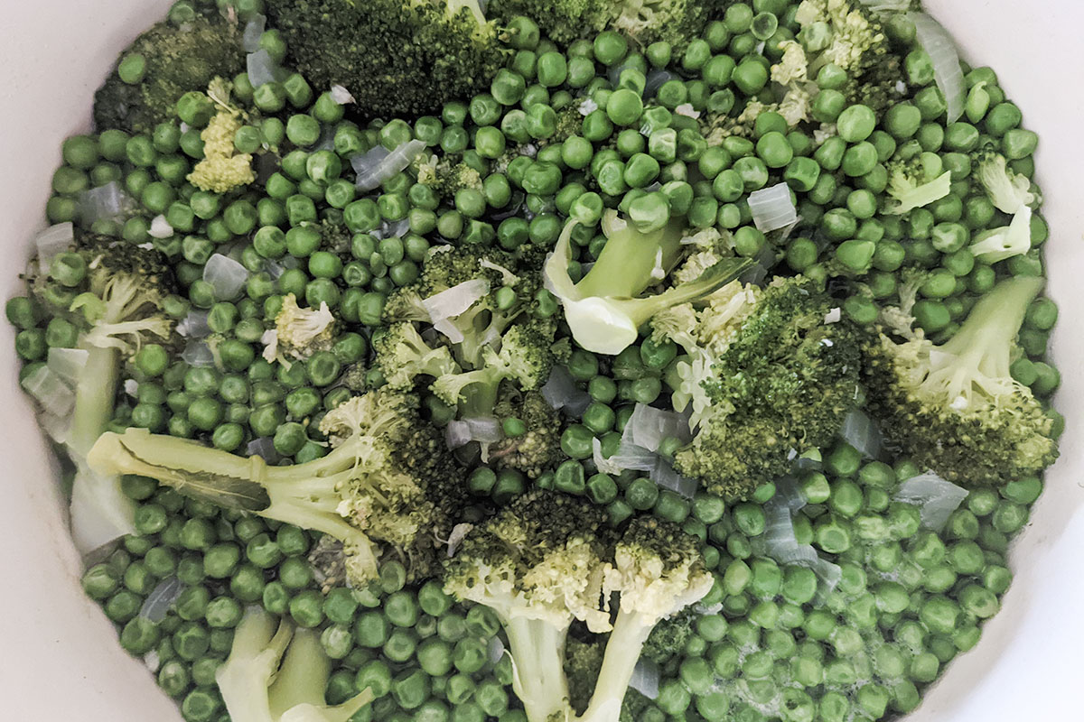 Simmering the broccoli and peas