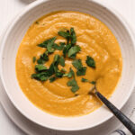 A serving of Spicy Roasted Carrot and Parsnip Soup