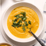 A bowl of Spicy Roasted Carrot and Parsnip Soup