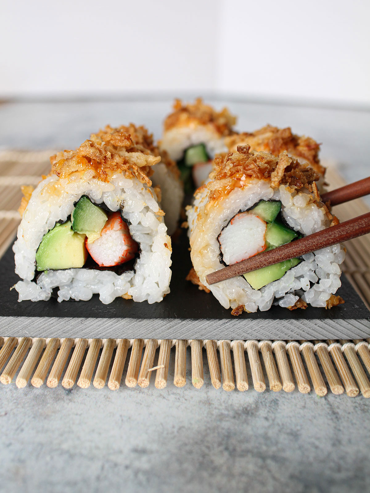 Sushi roll with smoked tuna with cucumber and - Stock Photo