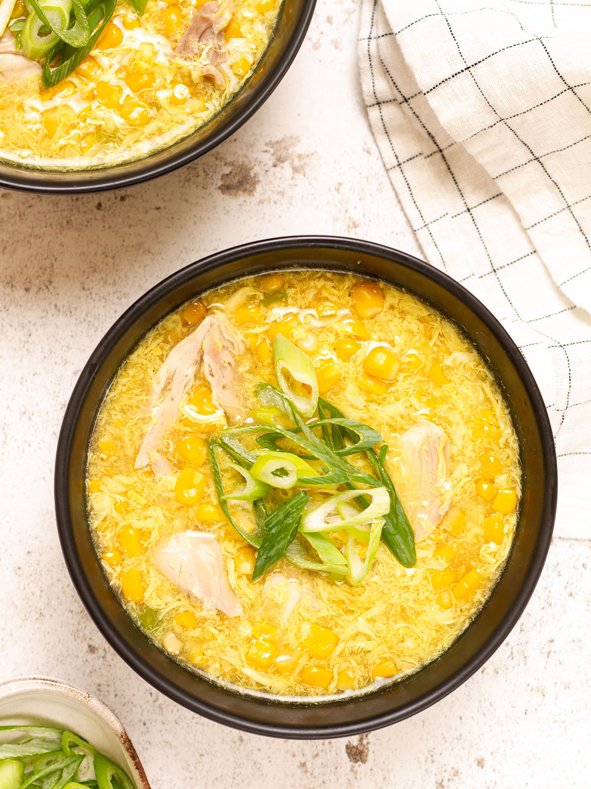 https://knifeandsoul.com/wp-content/uploads/2022/11/chicken-and-sweetcorn-soup-feature.jpg