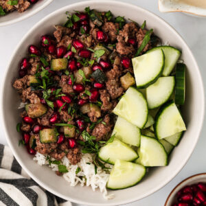 A serving of Ground Lamb Bowl in a white bowl on a white background.