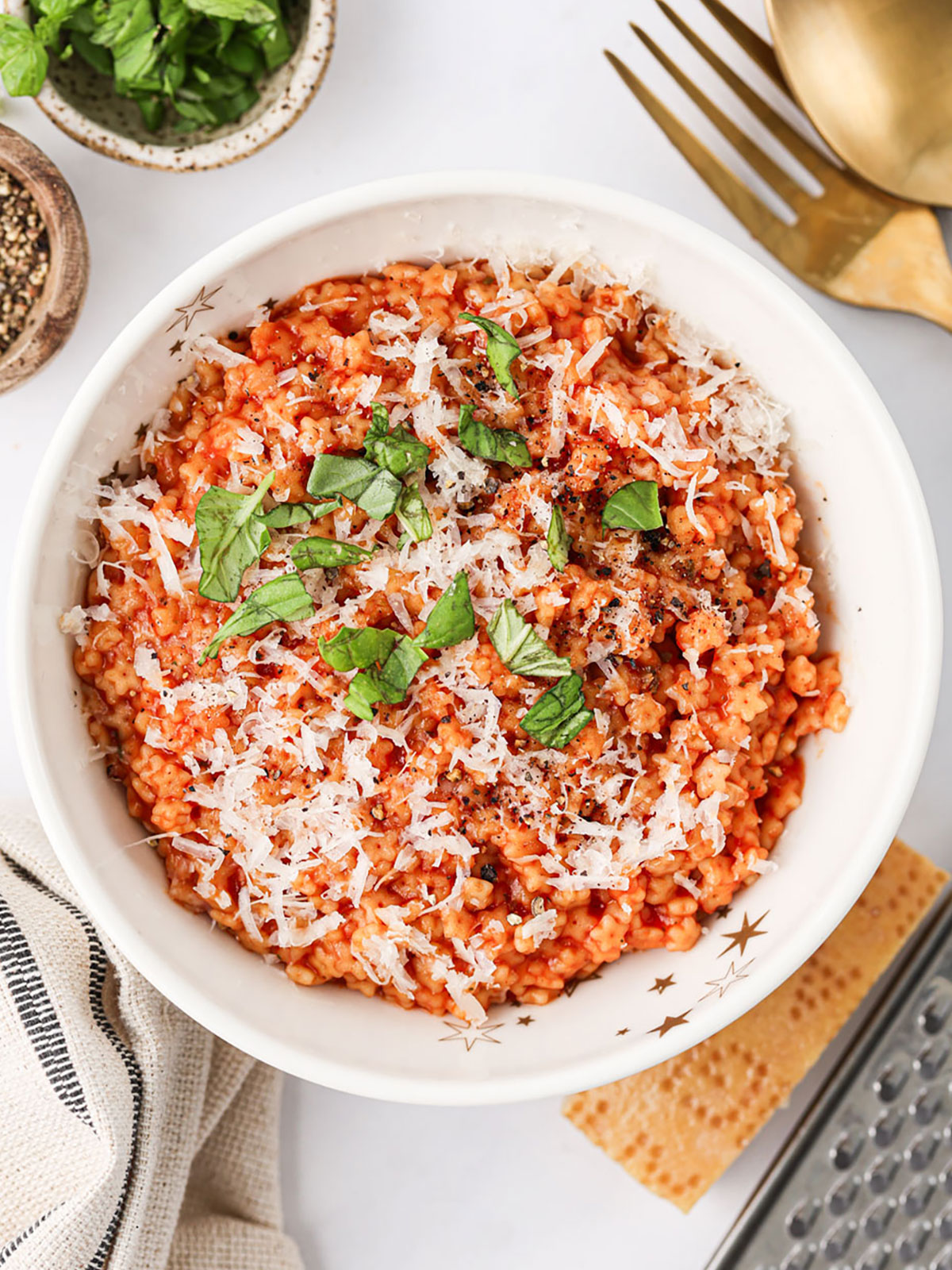 A serving of Tomato Pastina in a white bowl.