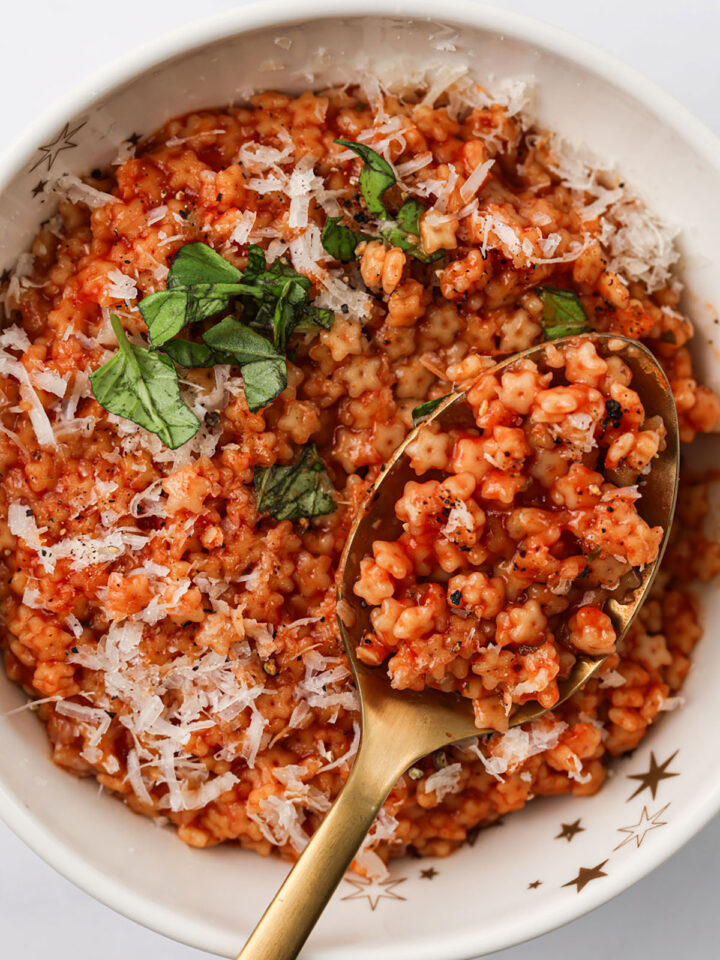 A serving of Tomato Pastina in a white bowl.