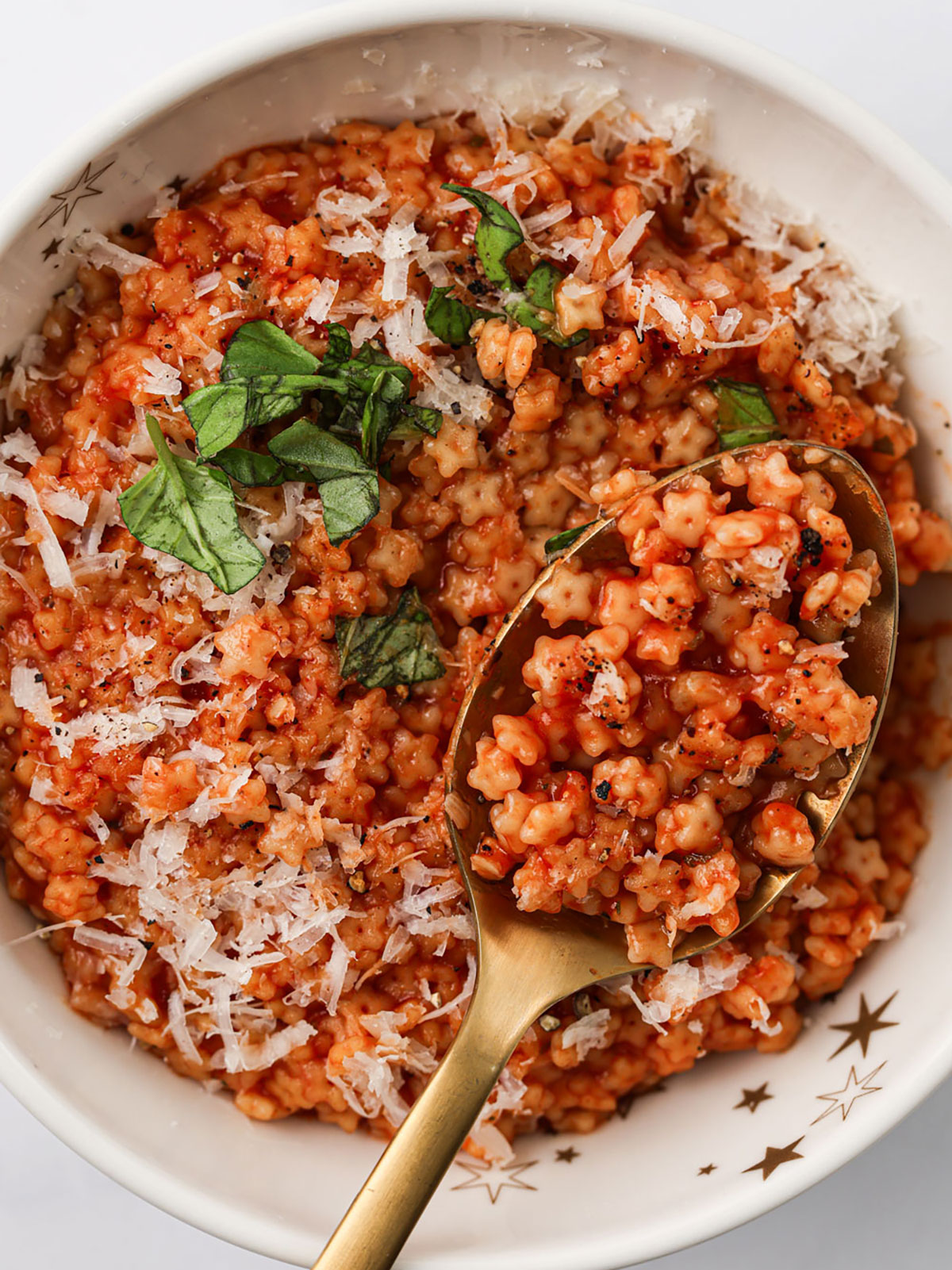 A serving of Tomato Pastina in a white bowl.