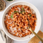A serving of Tomato Pastina in a white bowl.