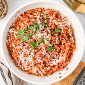 A serving of Tomato Pastina in a white bowl.